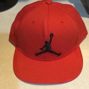 Red Nike Air baseball cap.